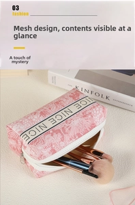 Detail view of pink textured makeup bag with interior space for multiple brushes