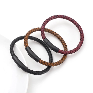 Three braided leather bracelets in black, brown and burgundy with black magnetic clasps