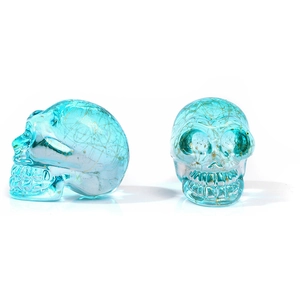 Translucent blue crystal skull ornaments with gold leaf inclusions for Halloween decor