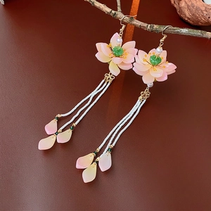 Elegant lotus pearl tassel earrings with pink glass petals and long white beaded drops
