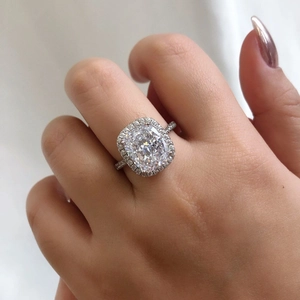 Detailed macro view of a S925 sterling silver ring with a cushion-cut cubic zirconia stone