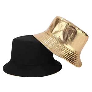 Reversible metallic gold and black PU leather bucket hat for a shiny fashion stage look