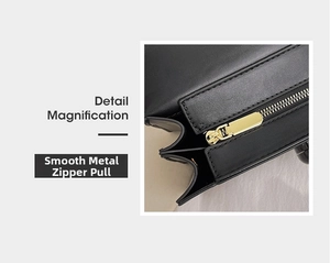 Close-up of smooth light-gold zipper hardware and textured black leather on women bag