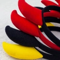 Three-piece Halloween devil horn headbands set in red, yellow, and black soft plush fabric