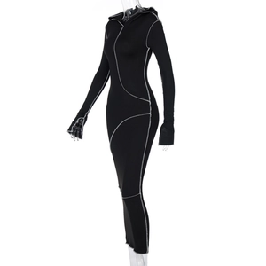 Close-up of contrast stitching on a black hooded long sleeve slim fit maxi dress