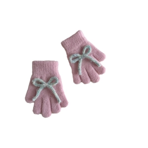 Cute pink knitted kids' gloves with blue bow decoration for warm autumn and winter wear