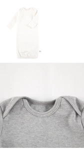 Detail of soft cotton baby sleeping sack showing white full view and grey neckline texture