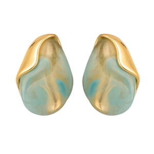 Macro detail of teardrop resin earrings with green marble texture and gold metal frame