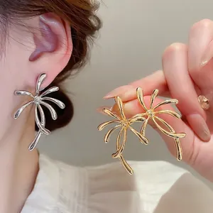 Polished gold and silver flower stud earrings in creative abstract starfish shape for women