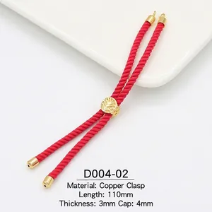 Detail of red 3mm braided cord with 18k gold tree of life sliding copper buckle
