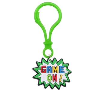 Macro view of green GAME ON! pixel art keychain pendant with PVC star shaped design