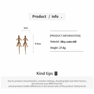 Detailed view of oversized gecko drop earrings with dimensions and rhinestone alloy details