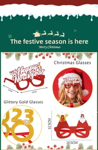 Close-up of glittery Christmas glasses with reindeer and Santa motifs for party decor