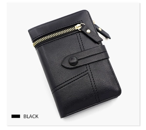 Detail of black PU leather wallet with gold zipper and stylish geometric stitching pattern