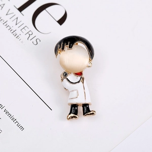 Cute cartoon doctor alloy brooch with opal stone head and golden medical stethoscope detail