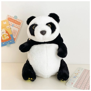 Detailed plush panda bag showing soft faux fur texture and yellow paw print embroidery