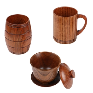 Set of four natural jujube wood cups and tea bowl with smooth dark brown grain finish