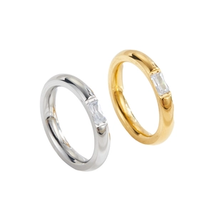 Minimalist gold and silver titanium steel rings set with rectangular cubic zirconia