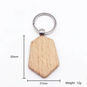 Detail showing dimensions of geometric beech wood keychain with 50mm and 31mm markings