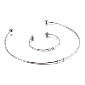 Minimalist silver stainless steel collar necklace and bracelet set with bead details