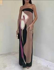 Detail view of floral print tube maxi dress with multi-color splicing and slim fit cut