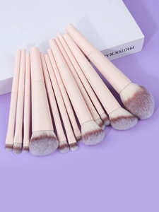 Detail view of 11-piece pink makeup brush set with soft dual-tone fiber bristles