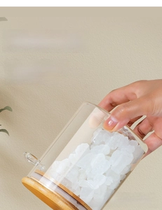Detail of borosilicate glass storage jar with airtight bamboo lid and silicone seal