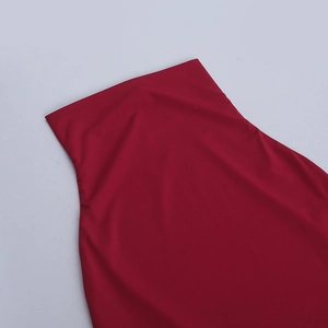 Detail shot of the deep red knitted fabric showing smooth texture and high collar stitching