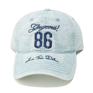 Detail of light blue denim baseball cap with navy blue 86 Gorgeous embroidery