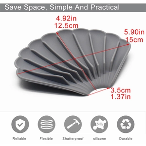 Shell shaped grey silicone soap dish with drainage slots and detailed dimensions