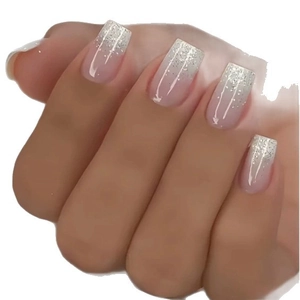 Short silver glitter gradient nude press-on nails with stylish trapezoid french tip shape