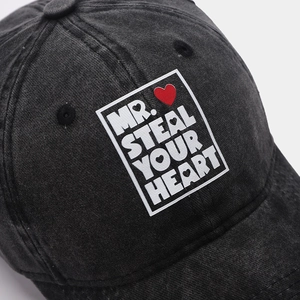 Detail of Mr. Steal Your Heart patch on vintage washed cotton baseball cap