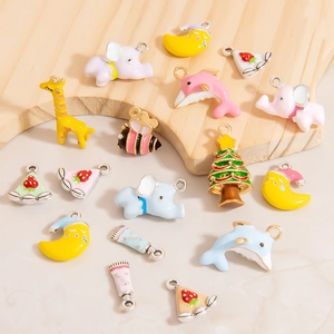 DIY enamel alloy charms set featuring moon, dolphin, and giraffe for jewelry making