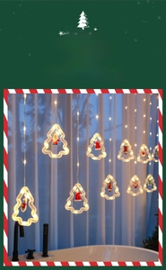 Detail of Christmas LED curtain string lights with Santa Claus and reindeer figurines