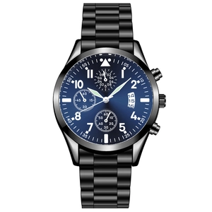 Macro detail of chronograph watch with blue sunray dial and matte black steel band