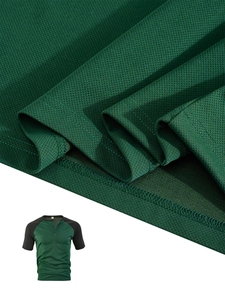 Detail view of breathable dark green pique honeycomb fabric on men's Henley shirt