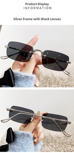 Detailed view of rimless sunglasses with silver metal temples and grey gradient lenses