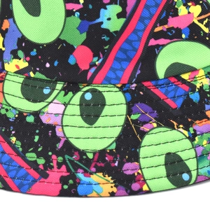 Close-up of reversible bucket hat with colorful ink splash and eye embroidery details