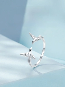 Detailed macro shot of the S925 sterling silver flying bird open ring with S925 engraving