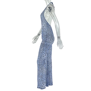 Side view of blue leopard print bodysuit featuring halter neck and open back design