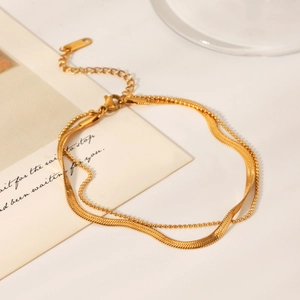 18K gold plated stainless steel layered flat snake and bead chain anklet on white background