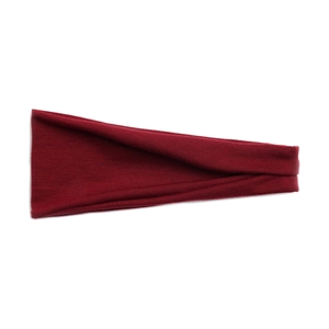 Close-up of wine red elastic sports headband with soft knitted texture on white background