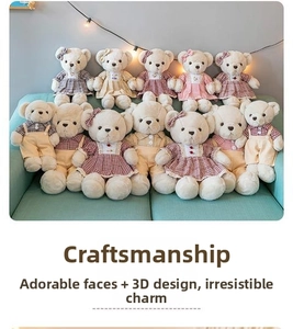 Detailed plush teddy bears in plaid outfits and dresses on a cozy green sofa