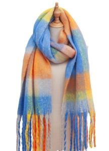 Detailed close-up of thick plaid scarf featuring blue, orange and yellow knit and soft tassels