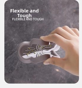 Flexible grey silicone material detail showing high toughness and wave texture