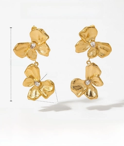 Detailed view of gold flower earrings with white zircon centers and size measurements