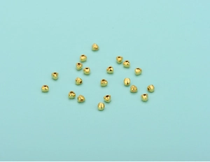 Macro shot of 925 sterling silver golden triangle spacer beads for DIY jewelry making