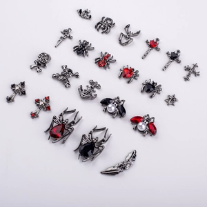 Gothic nail charms set featuring gunmetal skulls spiders and crosses with rhinestones