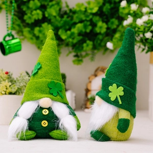 Detail of St. Patrick's Day gnomes with clover hats and soft felt textures on display