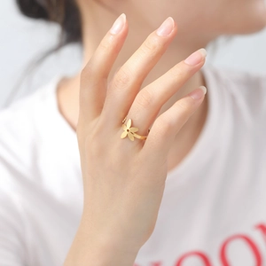 Minimalist golden stainless steel four-leaf flower open ring worn on finger